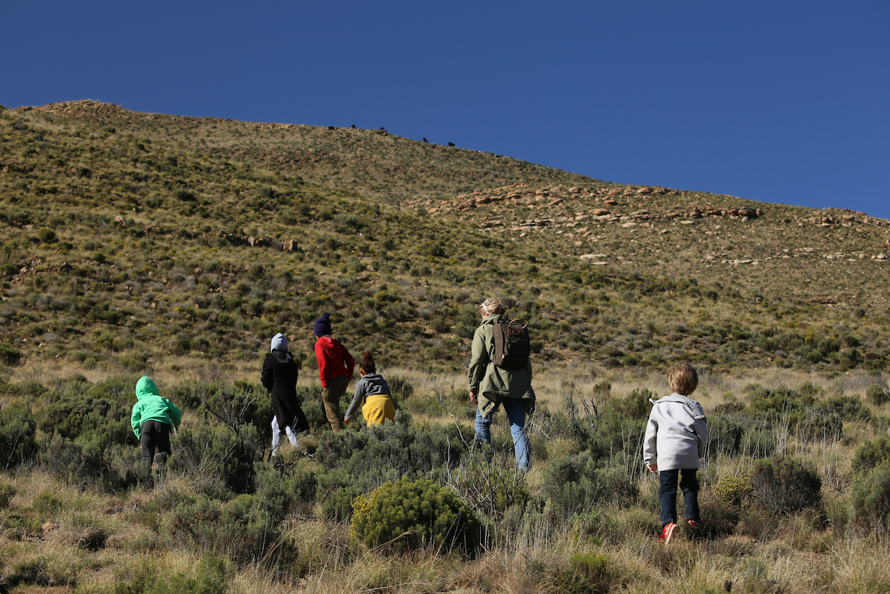 Image of a group of hikers exploring the quiet of Sneeuberg Nature Reserve, a haven in the Karoo with no air, light or noise pollution.